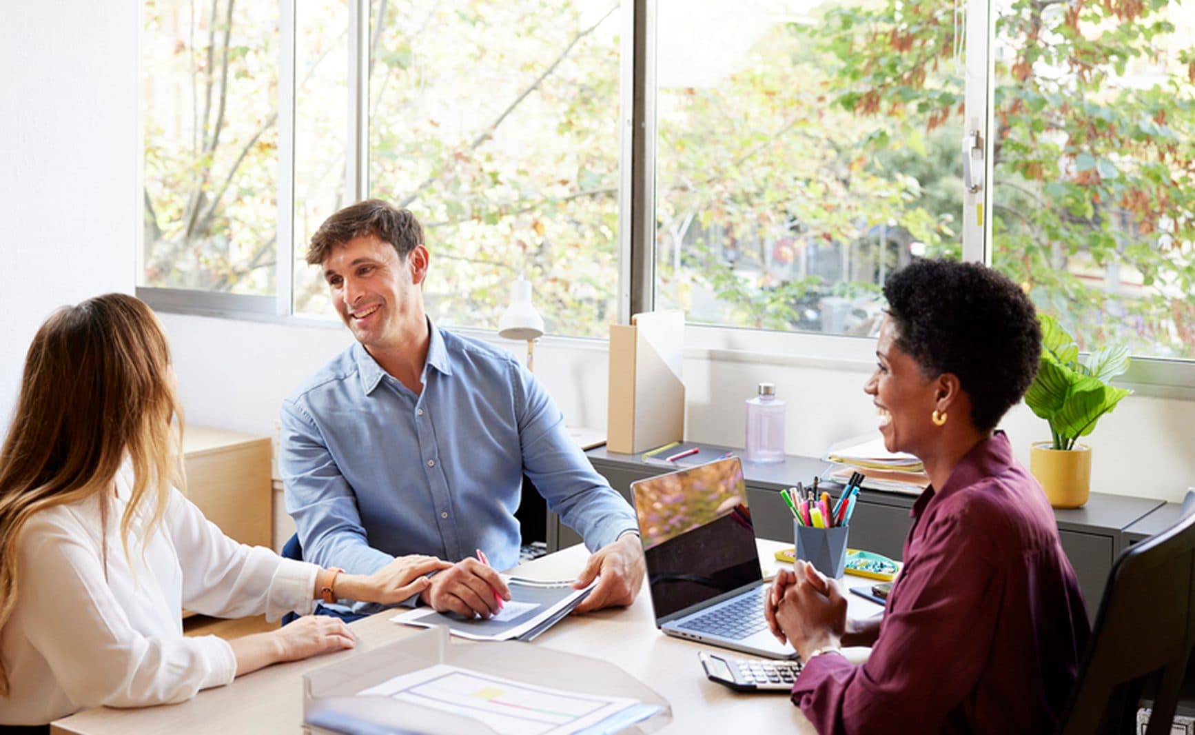 A Harness advisor meeting with clients