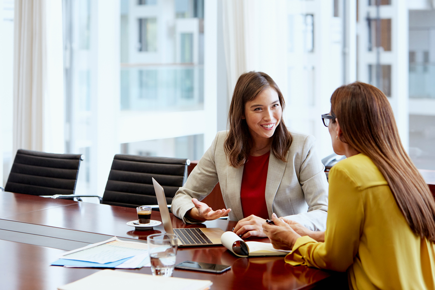 Tax advisor coworkers meeting in a conference room