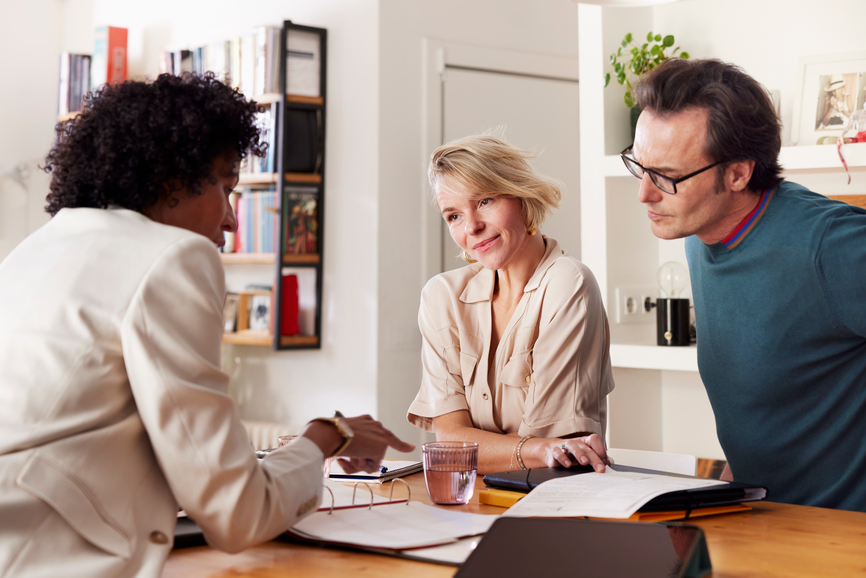 A couple meets with their financial advisor