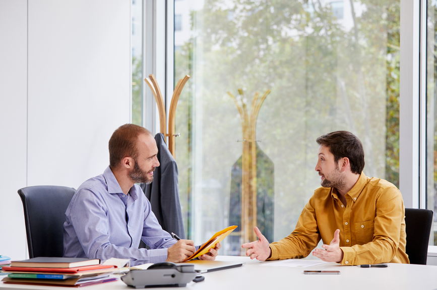 a financial advisor meeting with a client