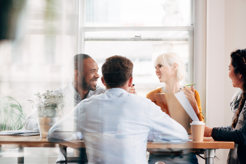 a business team meeting in an office setting