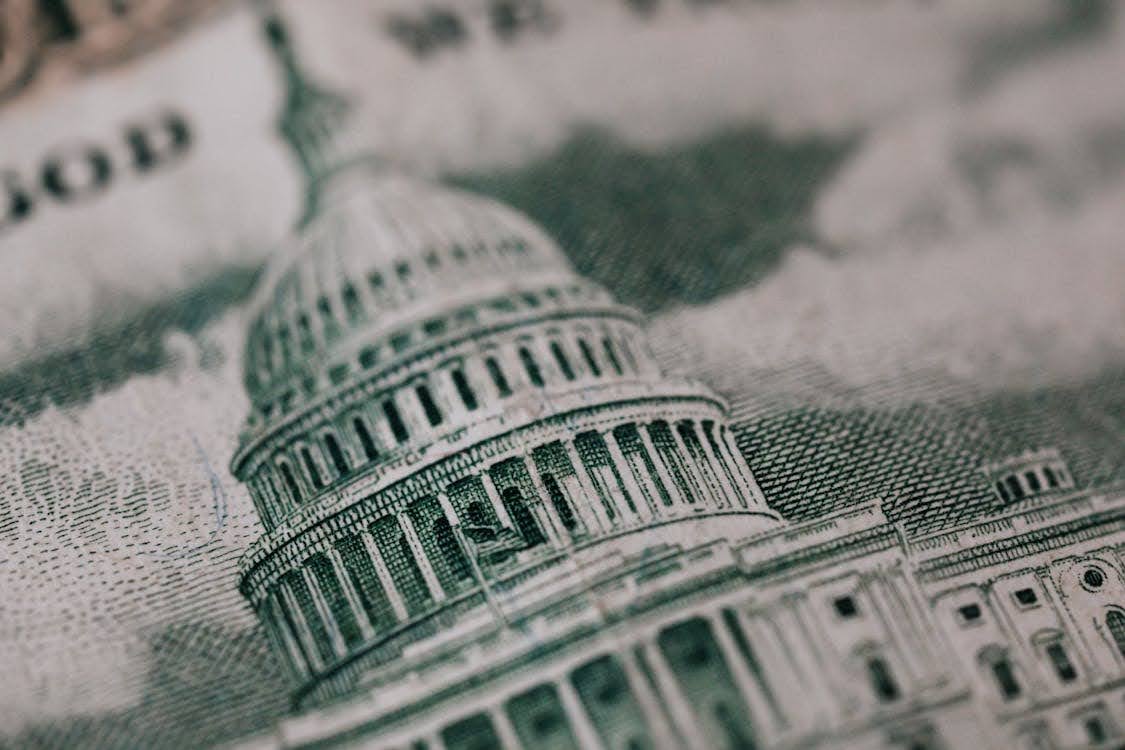 A close up of the US Capitol on a $50 bill