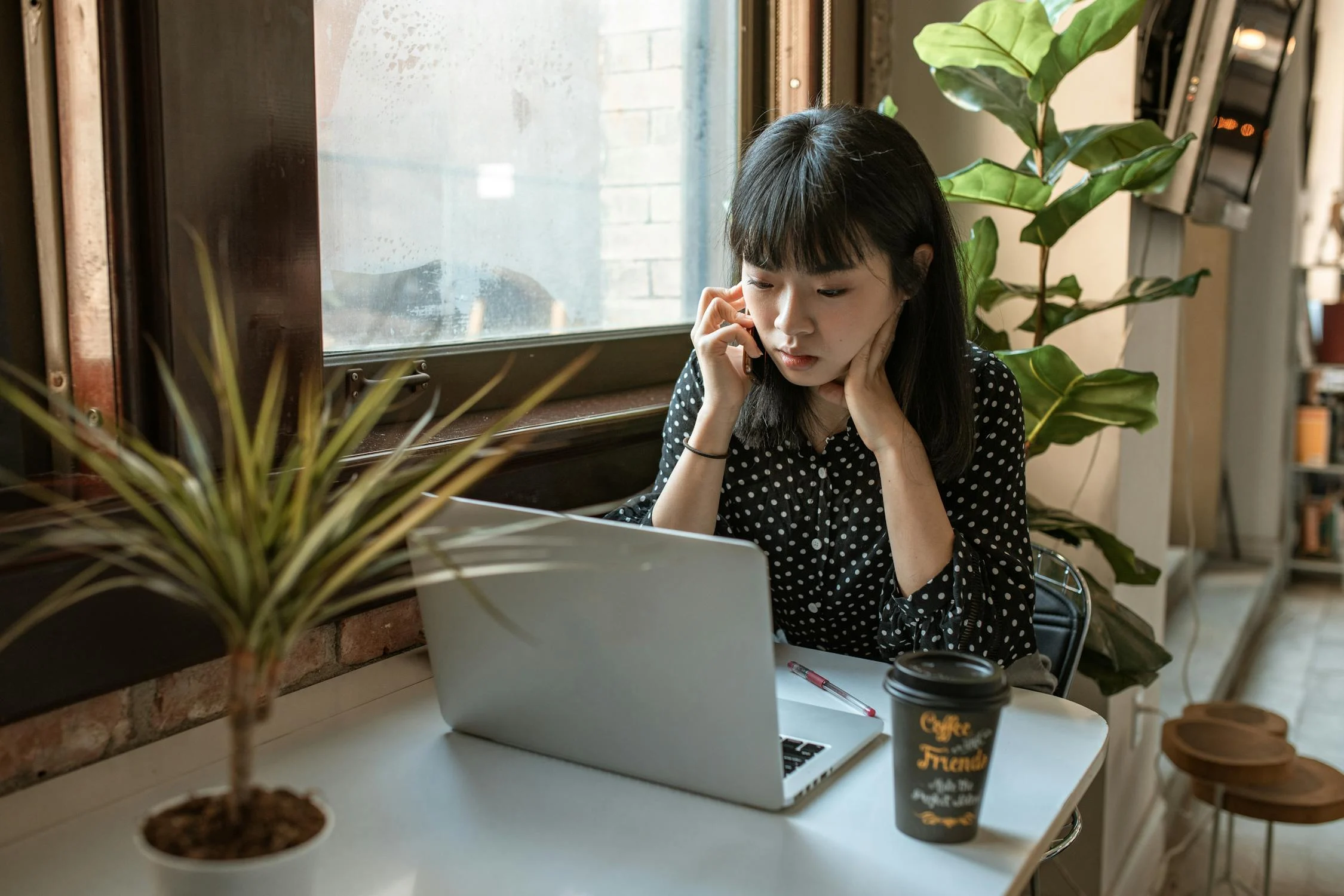 A woman working in a coffee shop