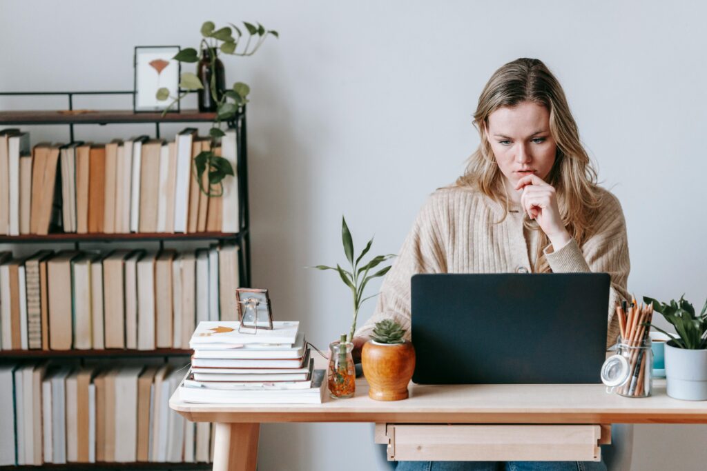 A woman sitting at a computer