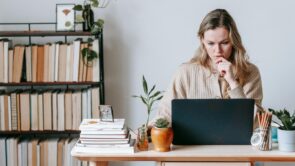 A woman sitting at a computer