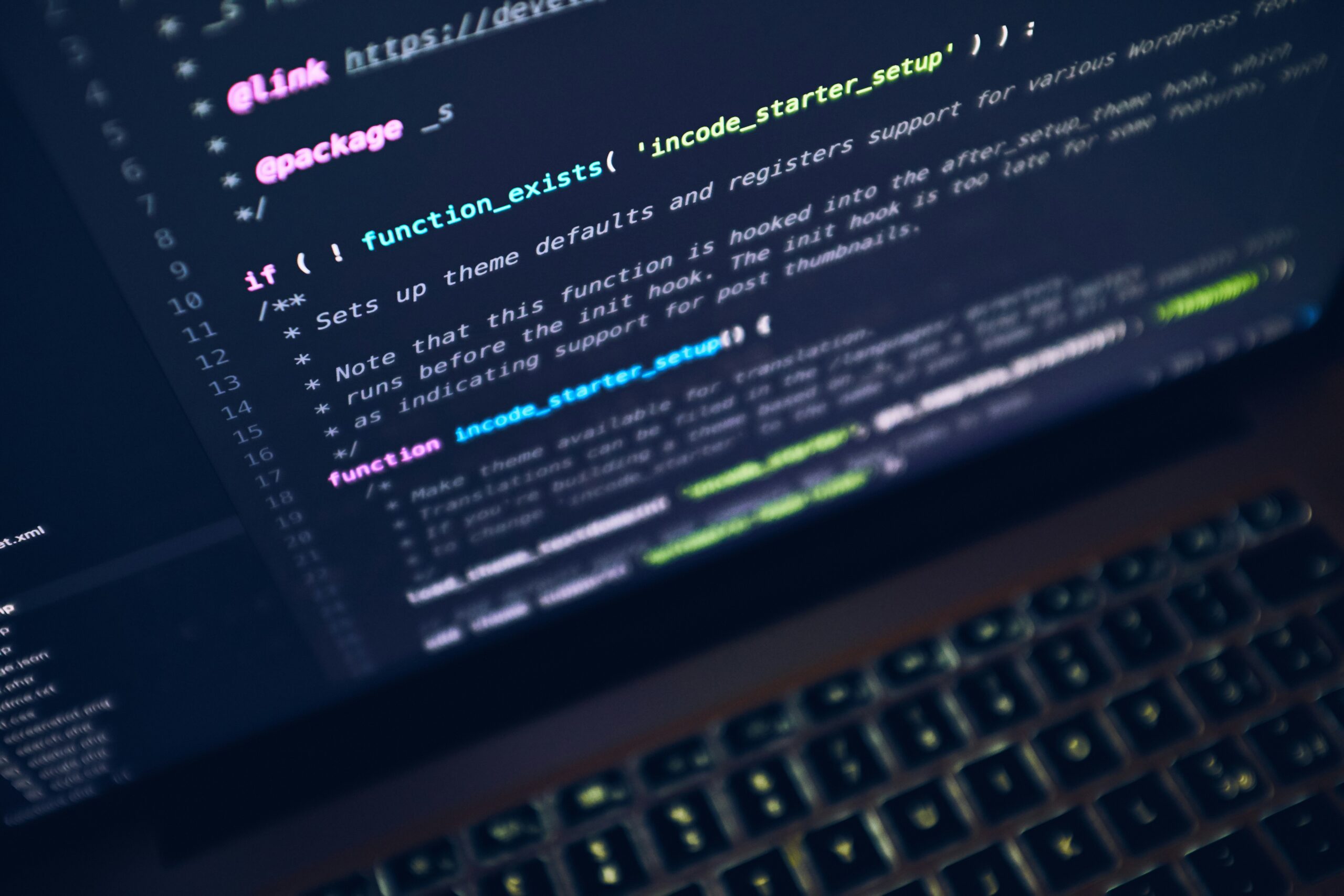 A close up of a computer screen with lines of code on the display