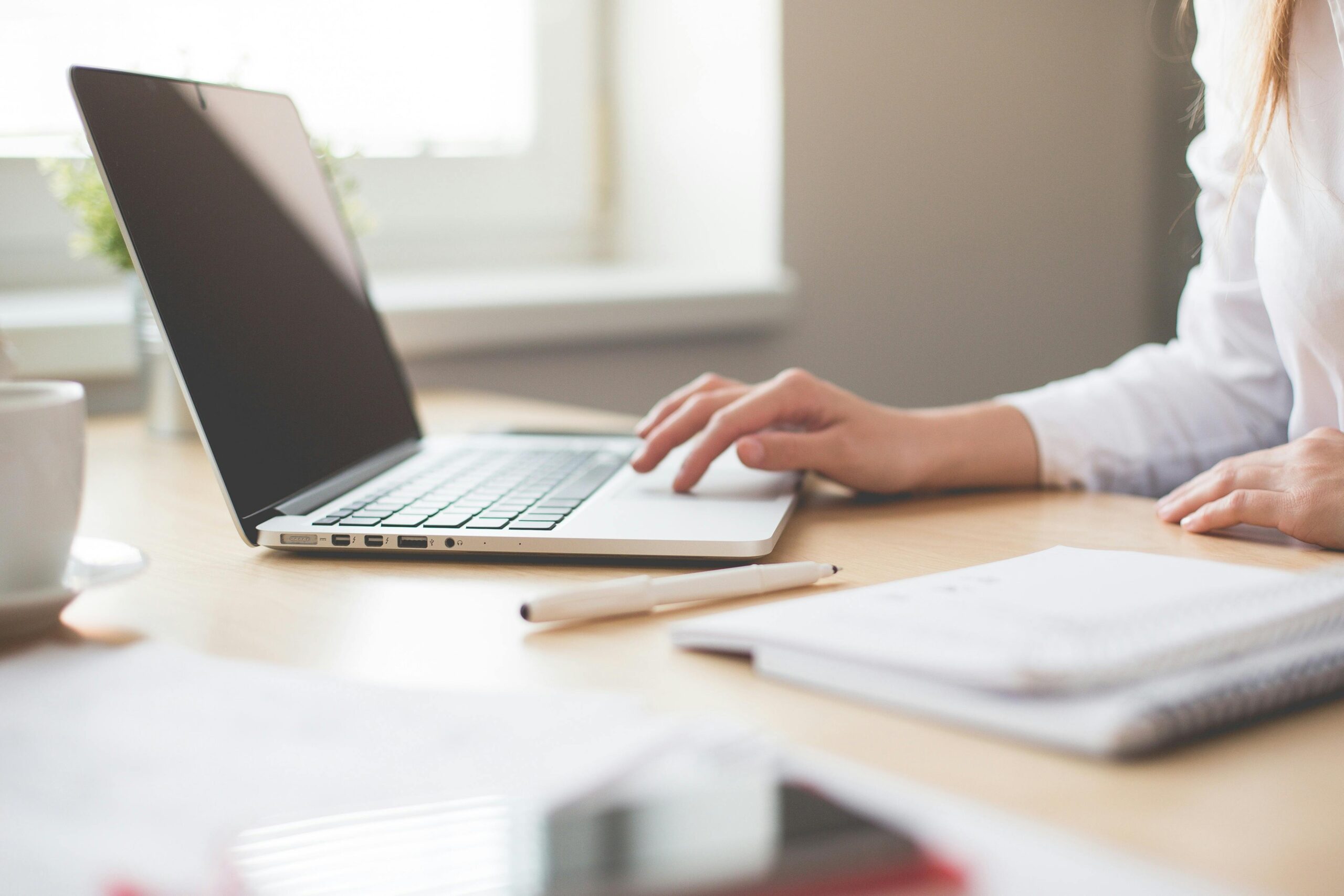 A woman using a laptop