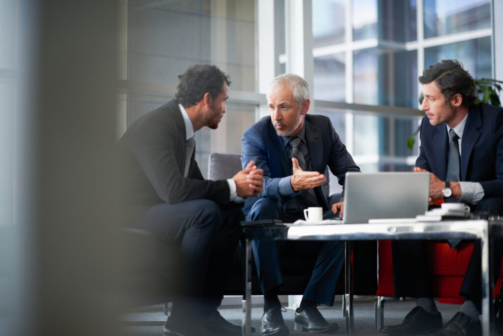 Mature business people discussing business strategy