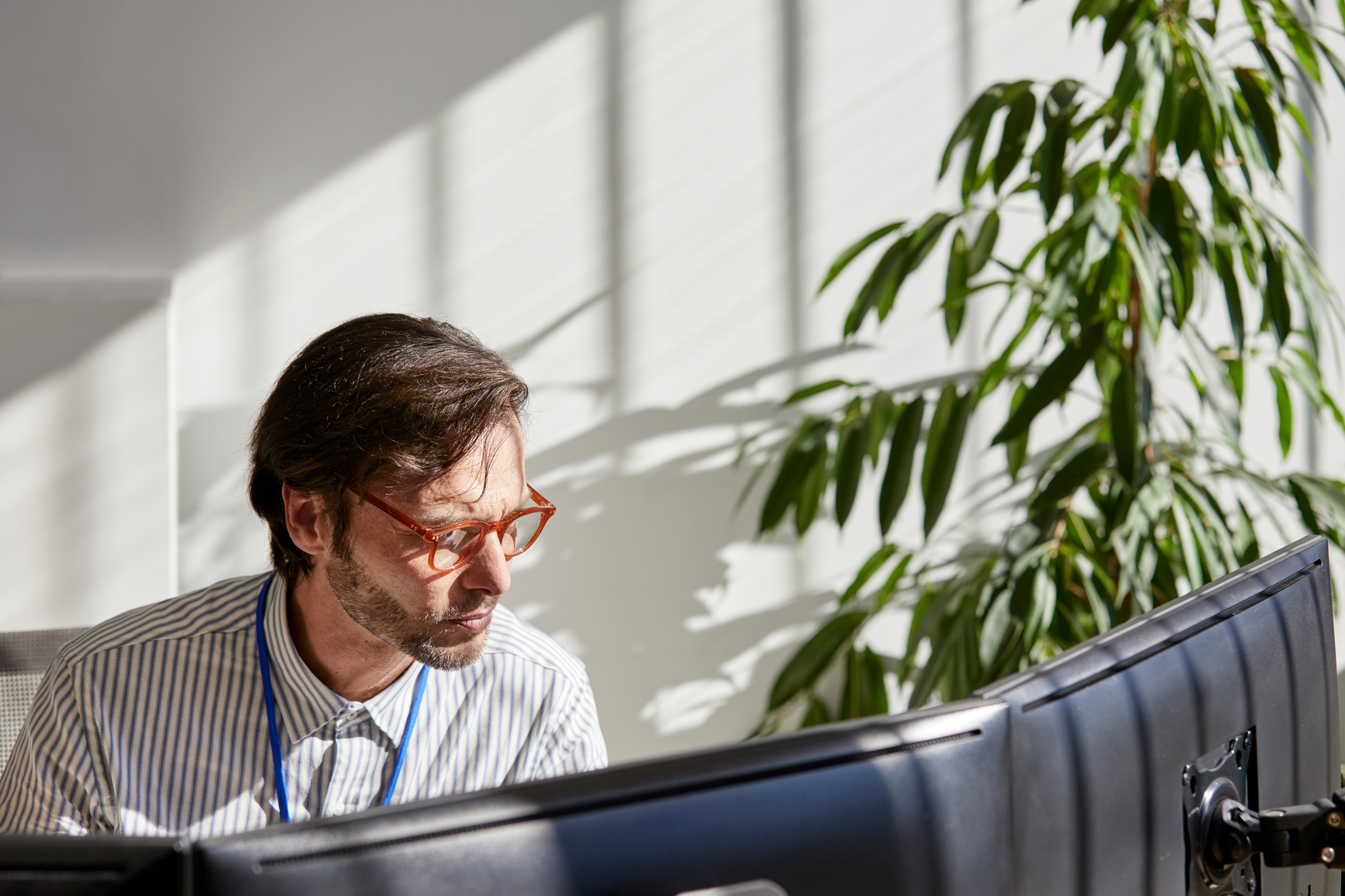 Businessman working on computers in the office
